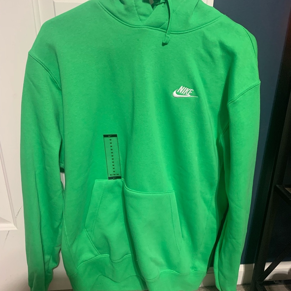 Green Nike jacket with tags